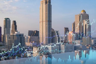 Işık saçan FOREX grafik hologramı, gün batımında Bangkok 'un panoramik şehir manzarası. Güneydoğu Asya 'da hisse ve tahvil ticareti. Fon yönetimi kavramı. Çift pozlama.