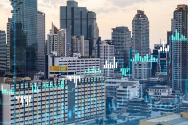 Işık saçan FOREX grafik hologramı, gün batımında Bangkok 'un panoramik şehir manzarası. Güneydoğu Asya 'da hisse ve tahvil ticareti. Fon yönetimi kavramı. Çift pozlama.