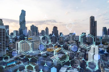 Parlak teknolojik süreç hologramı, gün batımında Bangkok 'un havadan panoramik manzarası. Güneydoğu Asya 'daki en büyük yenilikçi teknoloji merkezi. Çoklu pozlama.