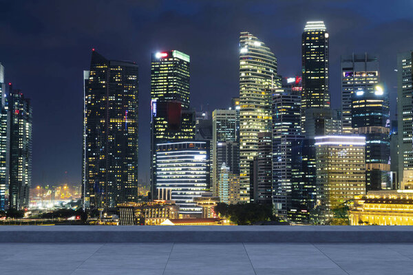 Panoramic Singapore skyline view, concrete observatory deck on rooftop, night time. Asian corporate and residential lifestyle. Financial city downtown, real estate. Product display mockup empty roof