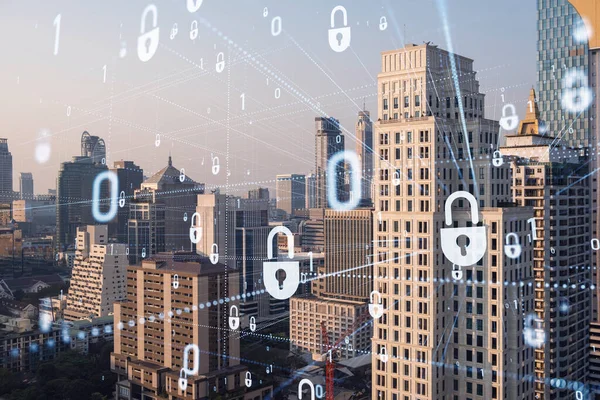 Güneydoğu Asya, Bangkok 'un günbatımı panoramik şehir manzarasında Padlock' un hologramı. Siber güvenlik istihbaratı kavramı. Çoklu pozlama.
