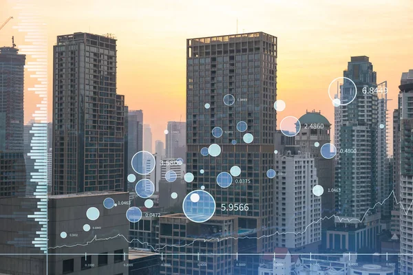 Pazar davranışı hologramı, günbatımı panoramik şehir görüntüsü, Güneydoğu Asya 'da mali derece alabilmek için popüler bir yer. Finansal veri analizi kavramı. Çift pozlama.
