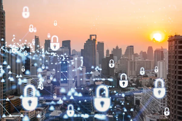 Güneydoğu Asya, Bangkok 'un günbatımı panoramik şehir manzarasında Padlock' un hologramı. Siber güvenlik istihbaratı kavramı. Çoklu pozlama.