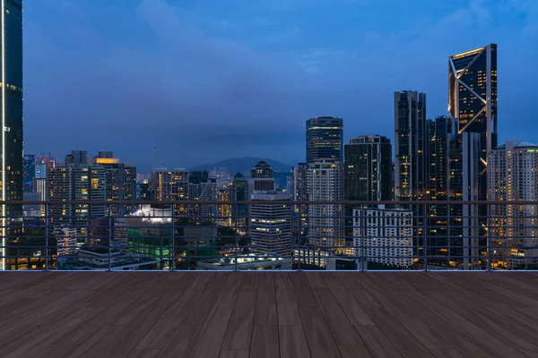 Panoramic Kuala Lumpur skyline view, wooden observatory deck on rooftop, night. Asian corporate and residential lifestyle. Financial city downtown, real estate. Product display mockup empty roof — Stock Photo, Image