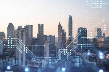 Parlak teknolojik süreç hologramı, gün batımında Bangkok 'un havadan panoramik manzarası. Güneydoğu Asya 'daki en büyük yenilikçi teknoloji merkezi. Çoklu pozlama.