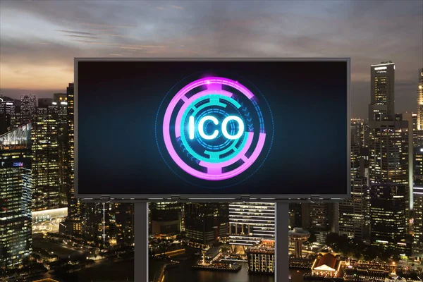 ICO hologram icon on billboard over panorama city view of Singapore at night time. The hub of blockchain projects in Southeast Asia. The concept of initial coin offering, decentralized finance