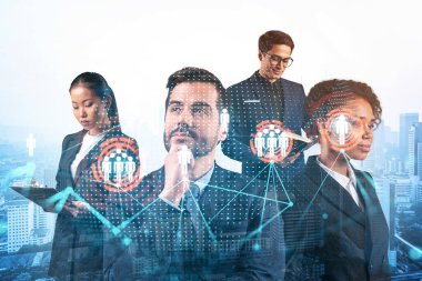 İş amaçlarına ulaşmak için sosyal medya pazarlama stratejisi üzerinde çalışan bir grup SMM uzmanı. Kuala Lumpur arkaplanı üzerinde hologram simgeleri.