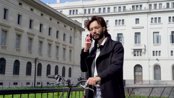 Side View Businessman Calls Phone While Standing Bicycle High Quality — Stock Video