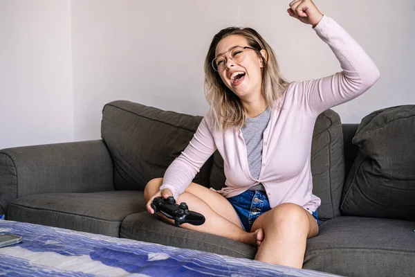 Young Woman Playing Video Games Her Living Room High Quality — Fotografia de Stock
