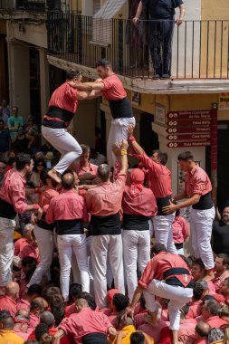 Vilafranca del Penedes, Spain, 20 August 2022: Human tower, castellers of Vilafranca del Penedes. Catalan tradition High quality photo