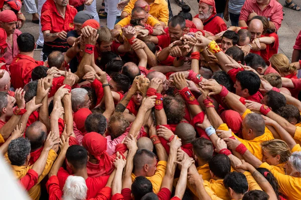 Vilafranca del Penedes, Spain, 20 August 2022: Human tower, castellers of Vilafranca del Penedes. Catalan tradition High quality photo