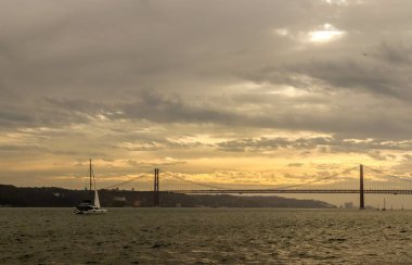 view of the river and the port of the Tejo River in Lisbom.