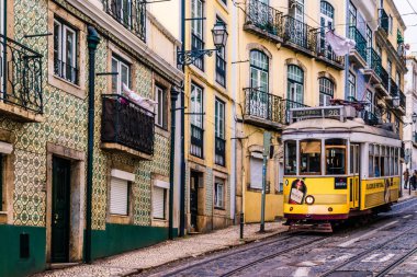 typical Lisbon tram down the street