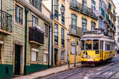 typical Lisbon tram down the street