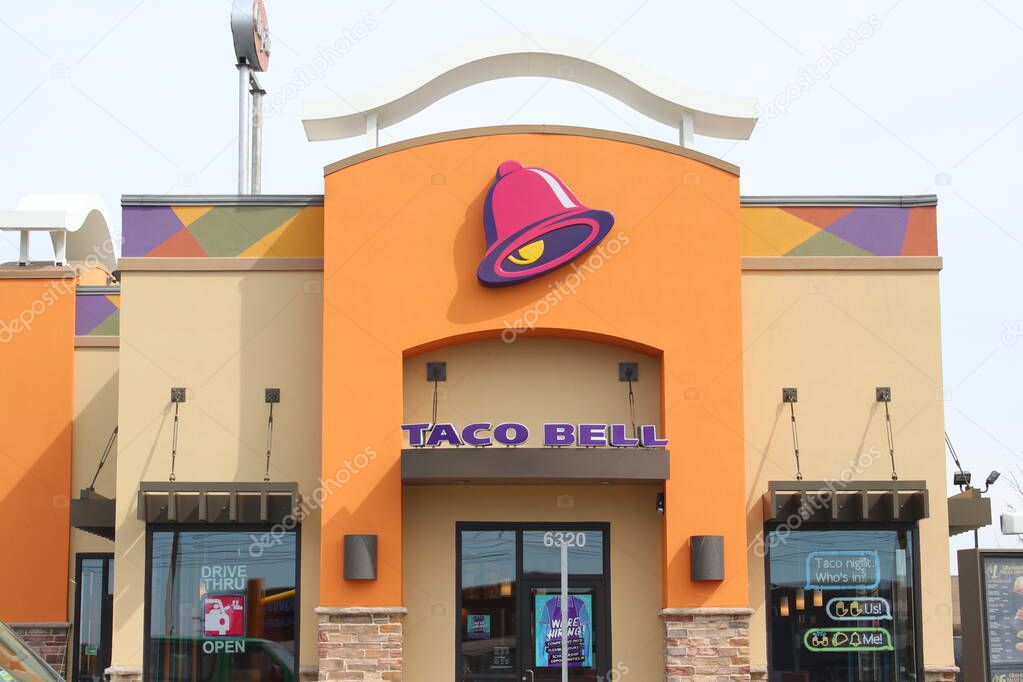Columbus, OH/USA April10,2019: Taco Bell Restaurant sign and logo. Taco Bell is an American chain of fast-food restaurants and serve a variety of Tex-Mex foods.