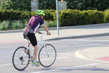 Columbus Ohio May 1, 2022Cyclist out for some exercise in sunny downtown Columbus