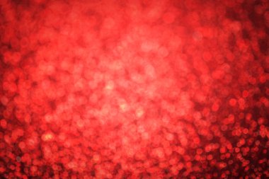 Odak dışı kırmızı bokeh. Noel için şenlikli bir geçmiş, yeni yıl, düğün.