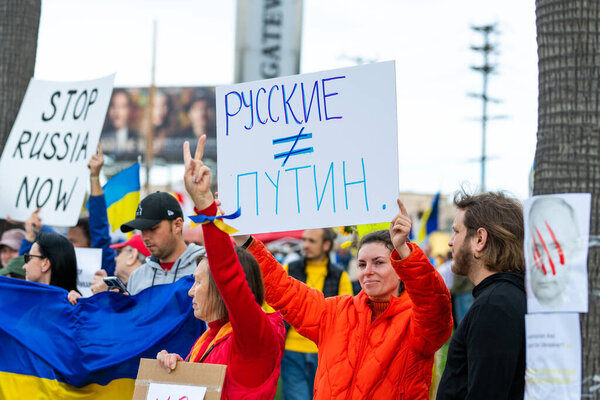 Los Angeles, California, USA - February 26, 2022: Russians against Putin. Demonstration against Russia war in Ukraine. Stop Putin, stop war. Fascism. Stand with Ukraine.