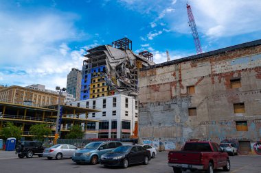 New Orleans, Louisiana, USA - JUNE, 2020: Apartment buildings in New Orleans destroyed by the hurricane. Construction, restoration, reconstruction after a hurricane. City street
