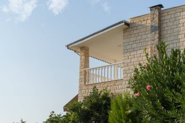 Balcony of a residential country house. Southern architecture.