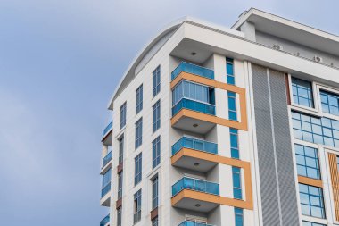 Modern multi-apartment residential building. New multi-storey residential building.