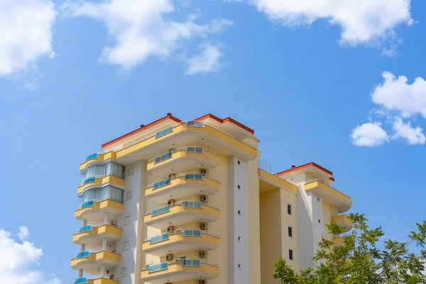 Detail of the exterior of an apartment building. Sunny day.