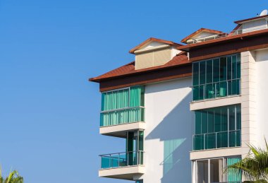 Modern apartment building. New building. Urban residential real estate.