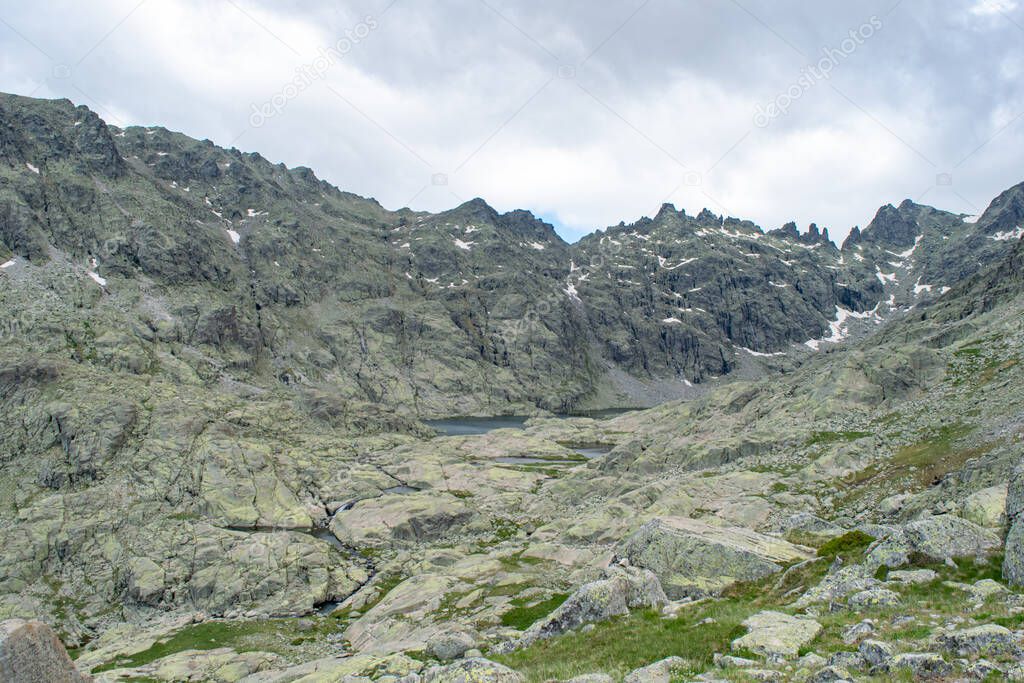 Landscape of the gredos cirque, the lagoon and its peaks