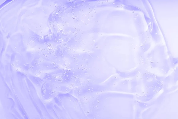 Lilac geleia desinfetante padrão abstrato. Textura de fundo de soro gel cosmético. Produto de cuidados com a pele com fluidos de ácido hialurónico com bolhas, cosméticos faciais com colagénio ceramida. — Fotografia de Stock