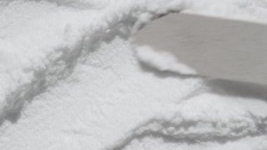 Diyet takviyesi, glukozamin, früktoz. Maltodextrin, dekstroz arka plan görüntüsü. Beyaz toz doku videosu. Kolajen veya protein, lysine, guarana, valine gibi biyokatkı maddeleri.