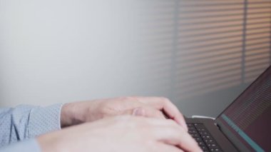 Programmer typing data code, working on project. Terminal with coding language. Developing programming and coding technologies. Website design. Coder developing in software develop company