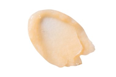 Beyaz arka planda saç kremi lekesi. Sarı kozmetik losyon nemlendirici numunesi yakın çekim. Vücut bakım kremi, retinol serumu, şampuan dalgalı doku. Cilt maskesi, kremalı temizleyici.