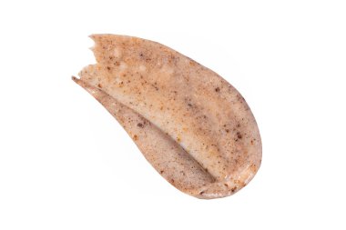 Pul pul dökülmüş krema lekesi. Aşındırıcı parçacık örneğiyle kozmetik cilt bakımı ürünü, nazik çıplak fırça dokusu izole. Leke örneği beyaz arkaplanda izole edildi.