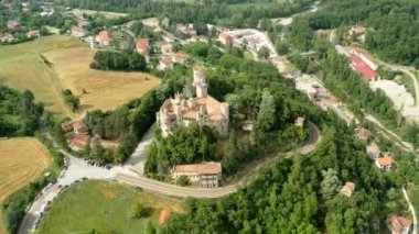 Aerial drone panoramic view of the Rocchetta Mattei castle in Italy on sunny summer day, view from above. High quality 4k footage