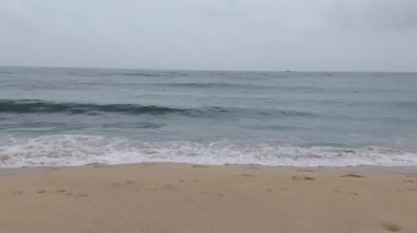 waves crashing in to the beach a view  from Arthunkal beach kerala India