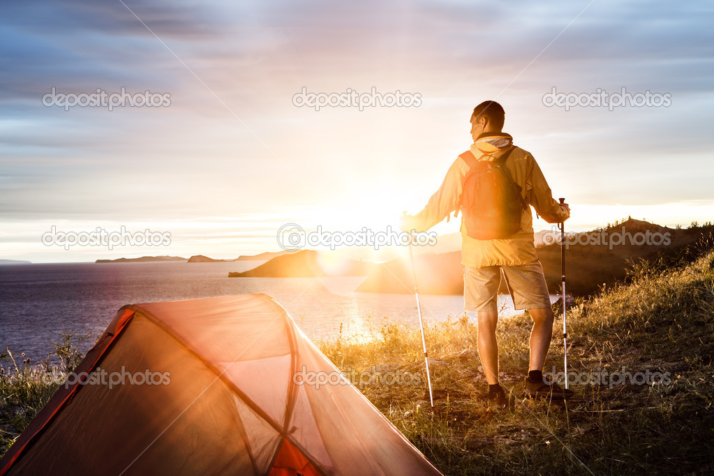 Backpacker in a camp