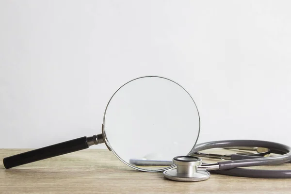 Stethoscope Magnifying Glass White Background — Zdjęcie stockowe