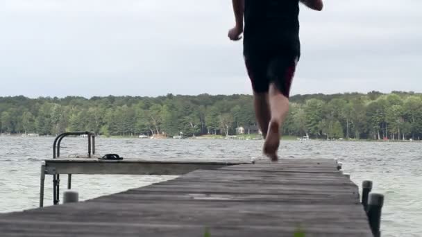 Jumping Off Dock — Stock Video