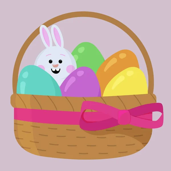 Carino coniglio cartone animato in un cesto con uova di Pasqua colorate. Clipart vettoriale multicolore. Biglietto pasquale, buona Pasqua. — Vettoriale Stock