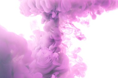 Vertical splash of purple paint in water against white background