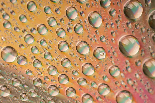 Fond de gouttes d'eau sur la surface du verre — Photo