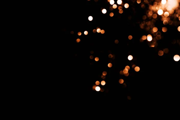 黒い背景のオーバーレイ層に対してぼやけた火花を落下 — ストック写真