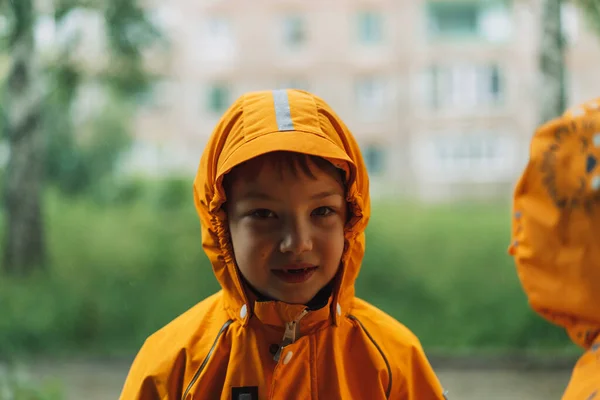 Boy Yellow Rain Suit Standing Rain — Foto de Stock