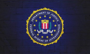 The FBI flag (Federal Bureau of Investigation) painted on a brick wall. clipart
