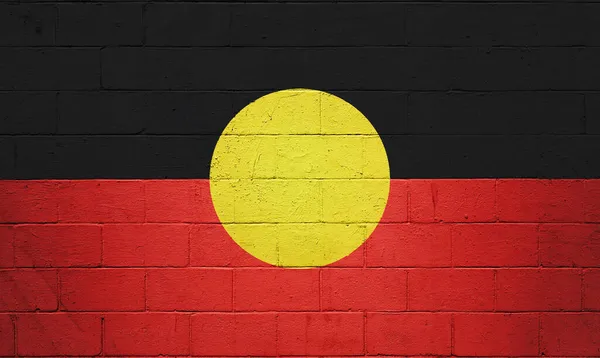 Bandera Aborigen Australiana Pintada Una Pared Ladrillo —  Fotos de Stock