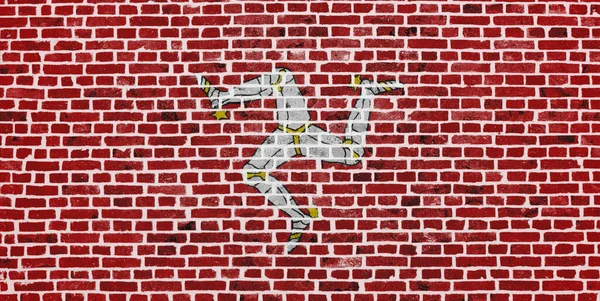 Detailní Záběr Cihlovou Zeď Vlajkou Ostrova Mann Namalovanou — Stock fotografie