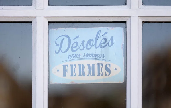 Close Closed Sign Saying French Desoles Nous Sommes Fermes Meaning — Foto de Stock