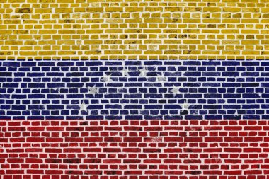 Close-up on a brick wall with the flag of Venezuela painted on it. clipart