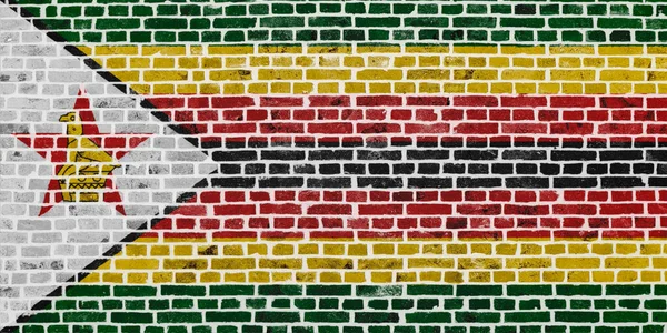 Närbild Tegelvägg Med Zimbabwes Flagga Målad Den — Stockfoto