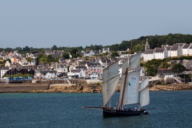 Douarnenez, France - July 17 2022: La Cancalaise is a bisquine replica built in 1987 in Cancale. She is rigged as a three-masted fishing lugger with full sails.